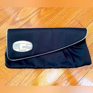 Black Guess clutch evening bag with gold detail
